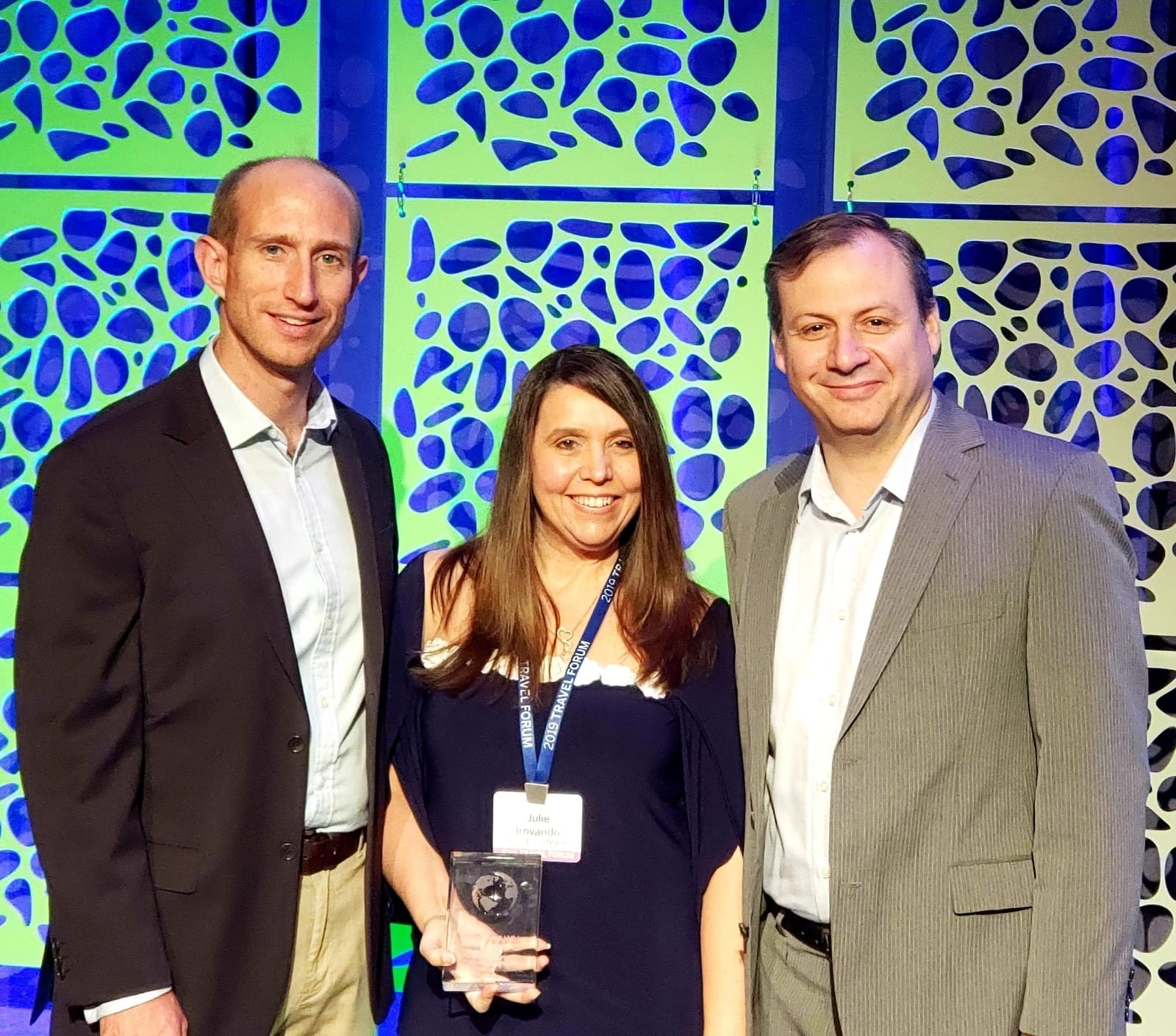 Julie Irovando, Cruise Planners travel advisor (center) honored with the prestigious Excellence in Card Benefits Fulfillment Award