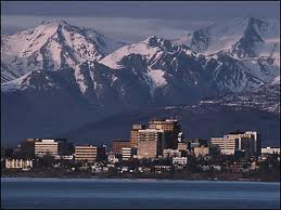 Anchorage Alaska city skyline with mountains in the background