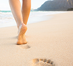 footprints in the sand on a holiday vacation